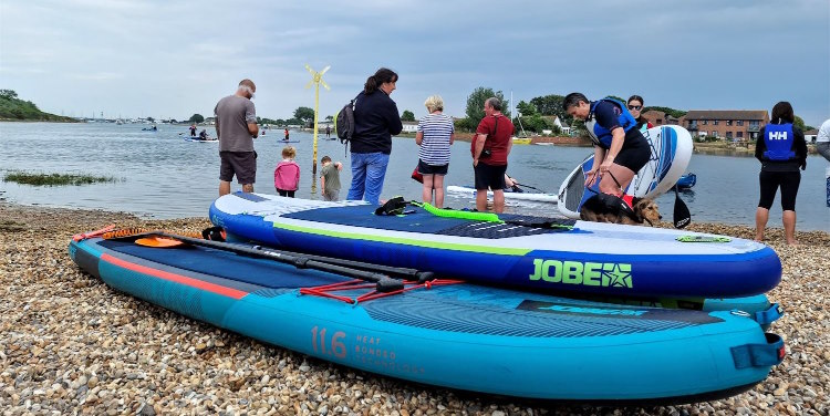 Learn to paddleboard in a safe area with Hayling Watersports at Fishery Creek