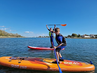 Local Attractions Hayling Island learn to paddleboard with family